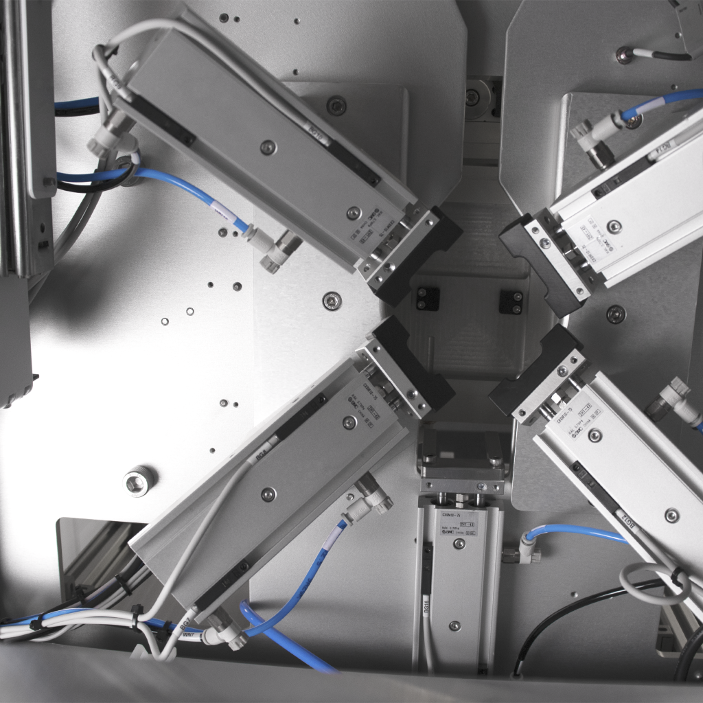 Vectralis pneumatic actuators applying stress during automated leak testing cycle in automotive applications