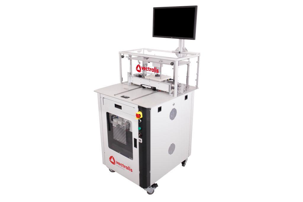 Automotive test system by Vectralis featuring V|box and custom fixture for high-voltage and communication testing